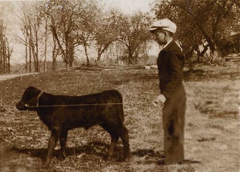J.L. Hoskins, and his calf