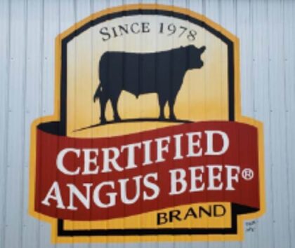 Official Certified Angus Beef logo painted on barn